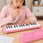 MELODICA DE 32 TECLAS, COLOR ROSADA, INCLUYE BOQUILLA Y MANGUERA - Miniatura 3